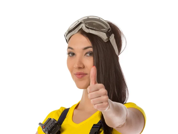 A female construction worker holding an up signal - isolated. — Stock Photo, Image