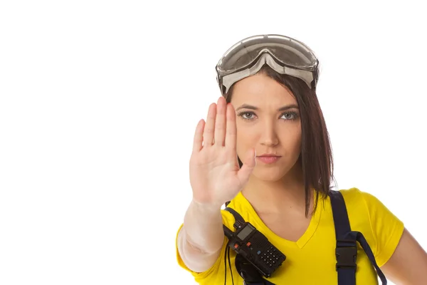 A female construction worker holding a stop signal - isolated. — Stock Photo, Image