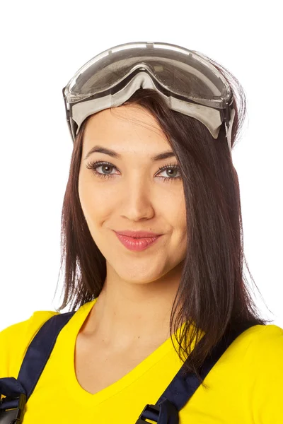 Serious female construction worker with goggles — Stock Photo, Image