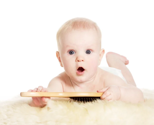 Baby boy with brush — Stock Photo, Image