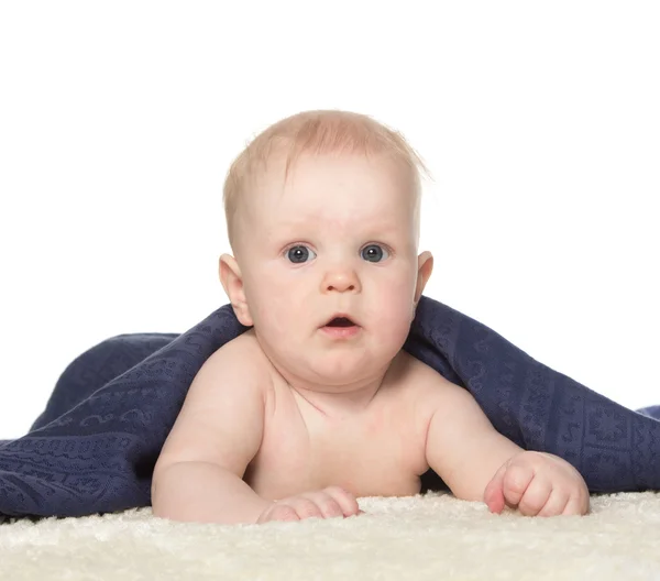 Adorable happy baby in colorful towel — Stock Photo, Image