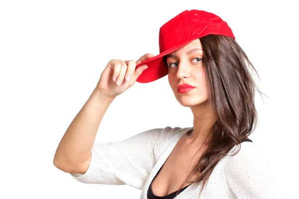 Jolie jeune femme portant une casquette de baseball rouge — Photo