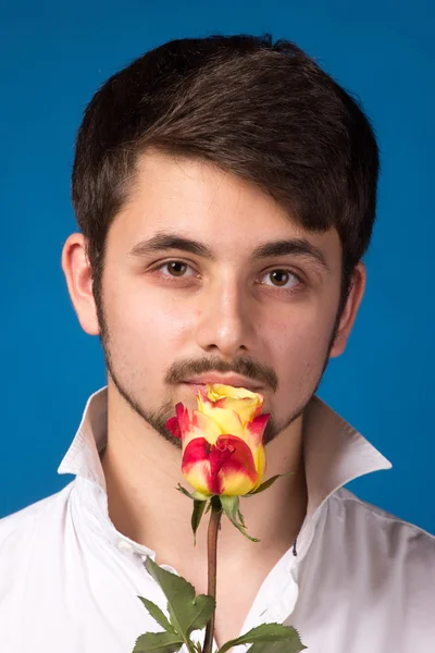 Man giving the red roses. Close up portrait. — Stock Photo, Image