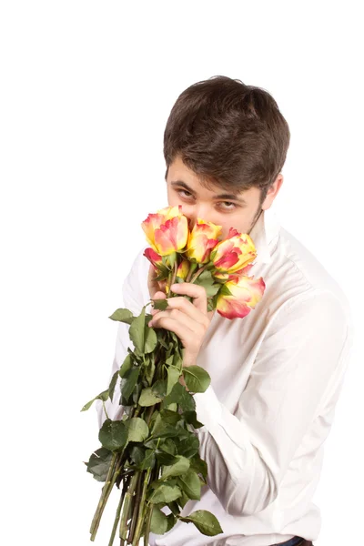 Man met boeket van rode rozen. — Stockfoto