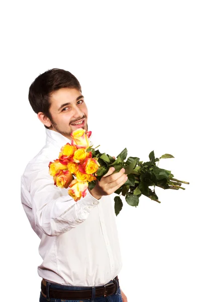 Homem com buquê de rosas vermelhas . — Fotografia de Stock