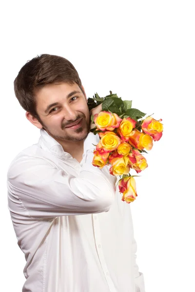 Mann mit Strauß roter Rosen. — Stockfoto
