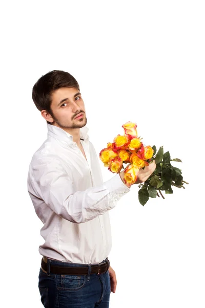 Mann mit Strauß roter Rosen. — Stockfoto