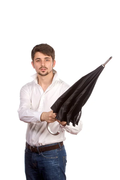 Young man with umbrella — Stock Photo, Image