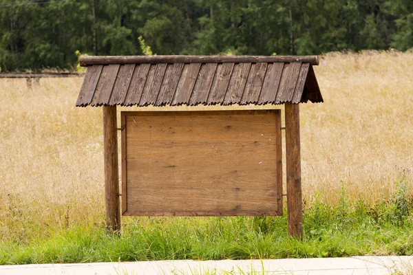 Hölzerne Anzeigetafel - leerer Raum für Ihren Text. — Stockfoto