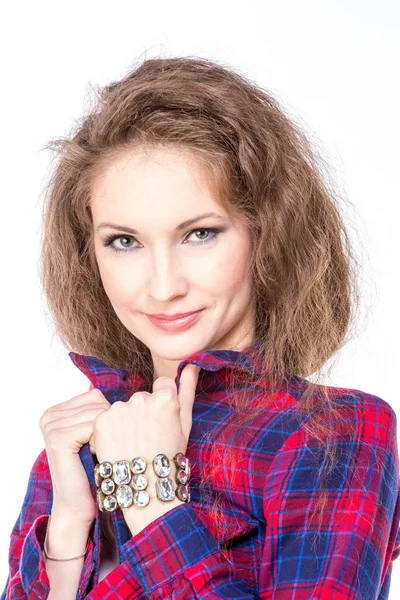 Attractive young woman in a checkered shirt — Stock Photo, Image