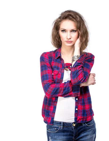 Atraktivní mladá žena v kostkované košili — Stock fotografie