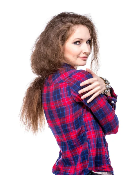 Aantrekkelijke jonge vrouw in een geruit hemd Terugkijkend — Stockfoto