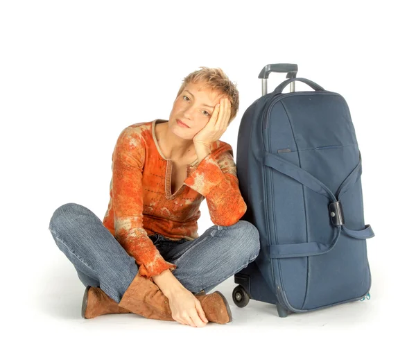 Mujer triste con maleta, aislada en blanco —  Fotos de Stock