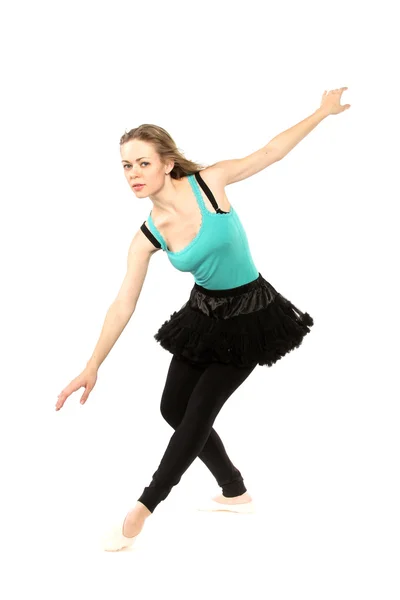 Moderní tanečnice žena představuje studio na bílém pozadí — Stock fotografie