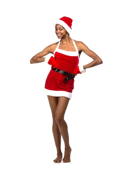 圣诞节黑人美国女人穿着圣诞老人的帽子带着笑容 — 图库照片