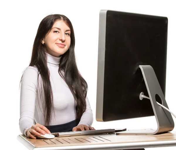 Pretty business woman sitting in front of computer — Stock Photo, Image