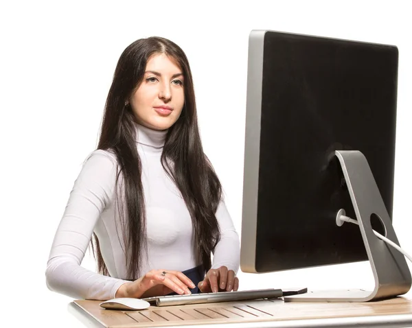 Pretty business woman sitting in front of computer — Stock Photo, Image