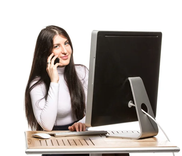 Pretty business woman sitting in front of computer — Stock Photo, Image