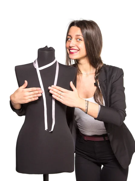 Young tailor posing with mannequin — Stock Photo, Image