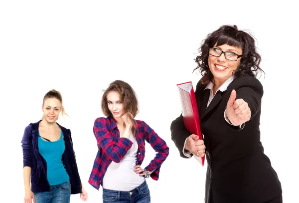 Cheerful senior business woman with friends behind him giving th — Stock Photo, Image