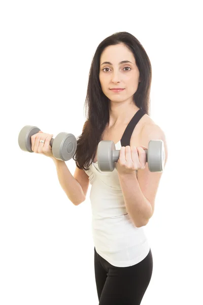 Woman working out with dumbbells. Isolated — Stock Photo, Image