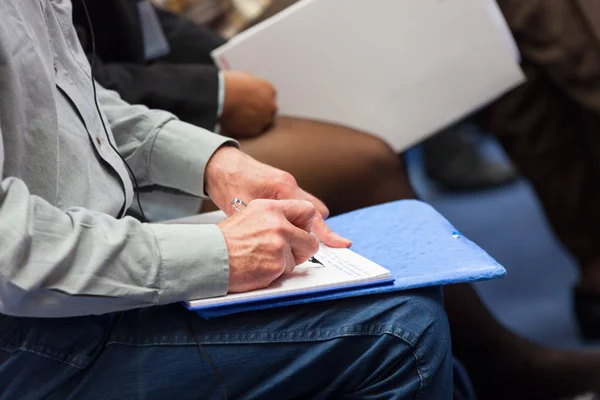 Making notes at conference, detail. — Stock Photo, Image