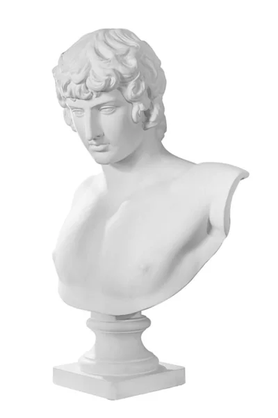 Gypsum copy of famous ancient statue Antinous bust isolated on a white background with clipping path. Plaster antique sculpture young man face. Renaissance epoch. Portrait 图库图片
