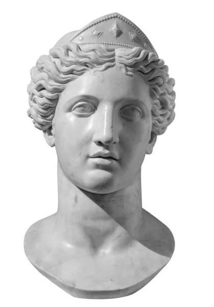 从白色背景中分离出来的古代雕像维纳斯头像的石膏复制品。石膏女雕塑家脸 图库照片