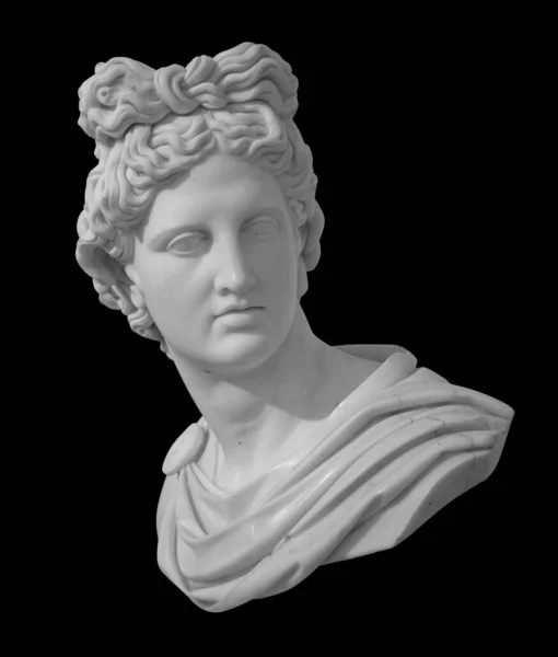 God Apollo buste beeldhouwkunst. Oude Griekse god van de zon en poëzie Pleisterwerk kopie van een marmeren beeld geïsoleerd op zwart met knipsel pad Stockfoto