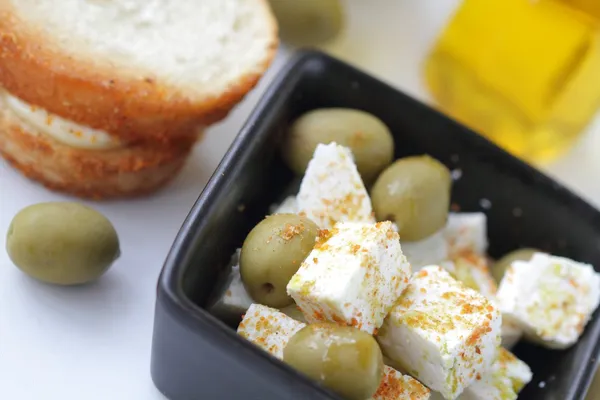 Salad with cheese and olives — Stock Photo, Image