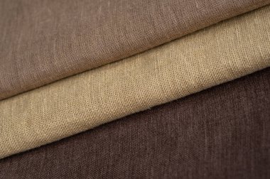 Kahverengi keten desenli arka plan. Kumaş şeritleri. Sığ noktalı Macro