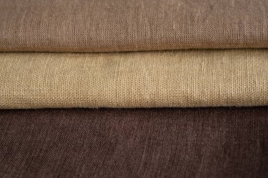Kahverengi keten desenli arka plan. Kumaş şeritleri. Sığ noktalı Macro