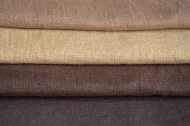 Kahverengi keten desenli arka plan. Kumaş şeritleri. Sığ noktalı Macro