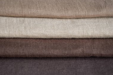 Kahverengi keten desenli arka plan. Kumaş şeritleri. Sığ noktalı Macro