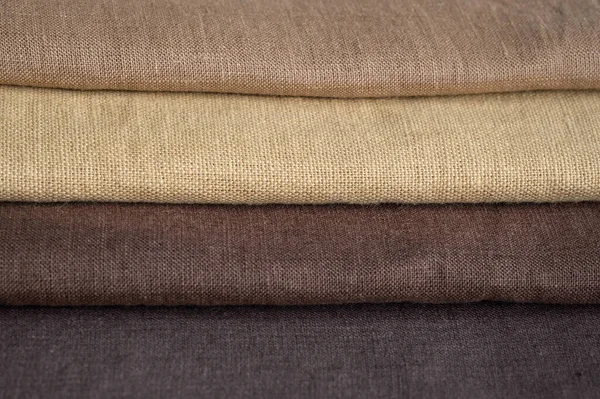 Kahverengi keten desenli arka plan. Kumaş şeritleri. Sığ noktalı Macro