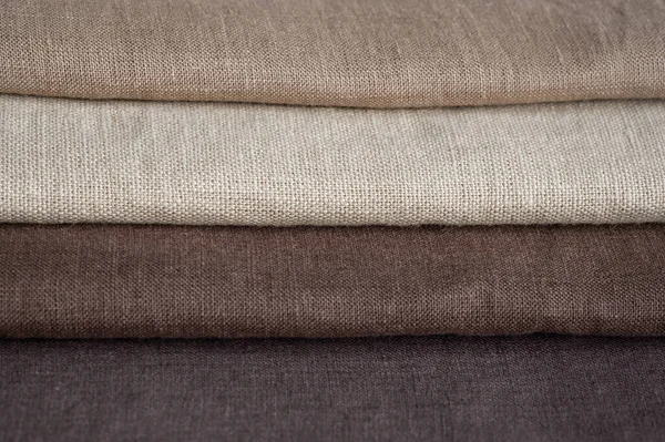 Kahverengi keten desenli arka plan. Kumaş şeritleri. Sığ noktalı Macro