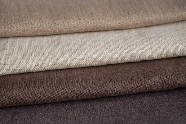 Kahverengi keten desenli arka plan. Kumaş şeritleri. Sığ noktalı Macro