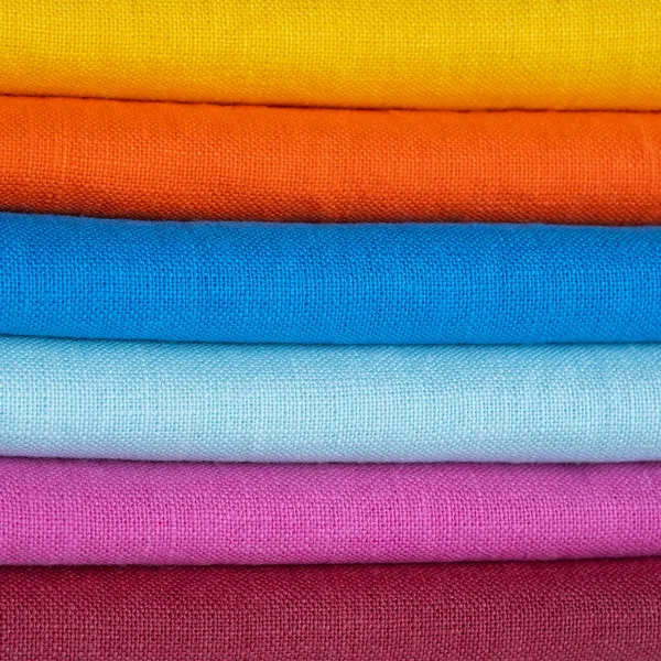 Una Pila Tessuto Lino Luminoso Multicolore Primo Piano Sfondo Lino — Foto Stock