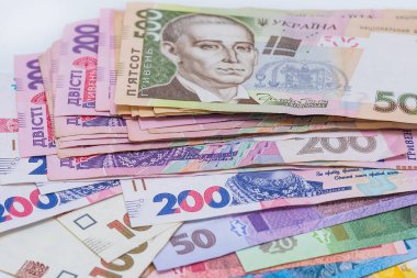 Ukrayna Hryvnia 'sı, arka plan. Maaş, emekli maaşı, enflasyon, depozito ve kredi alma kavramı. Kamu hizmetleri, enerji, kazı fiyatlarını artırma kavramı