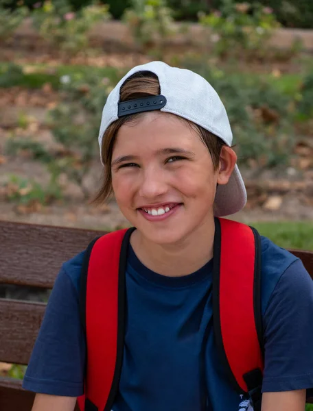 Cute Smiling Boy Hat Looking Camera Resting Bench Hot Summer — Stock Photo, Image