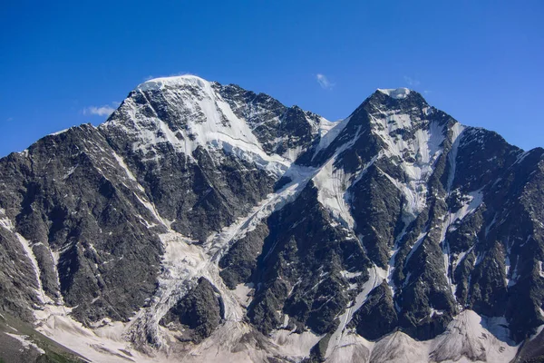 View of the Mount Donguz-Orun(3769 m), glacier Seven. Elbrus, Caucasus. International Mountaineering Day - 8 August. International Mountain Day - 11 December