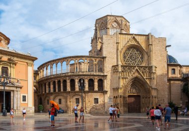 Valencia, Spain - August 07, 2019: Cathedral of Valencia on the Square of the Blessed Virgin. A lively square in the center of Valencia