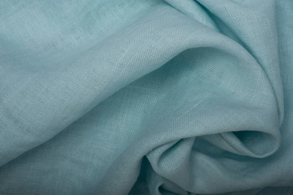 Wrinkled linen cloth folded napkins. Linen fabric texture. Concept of using natural eco-friendly materials