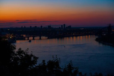 Night panorama of Kyiv. Kiev - Capital of Ukraine. View of the Dnipro River