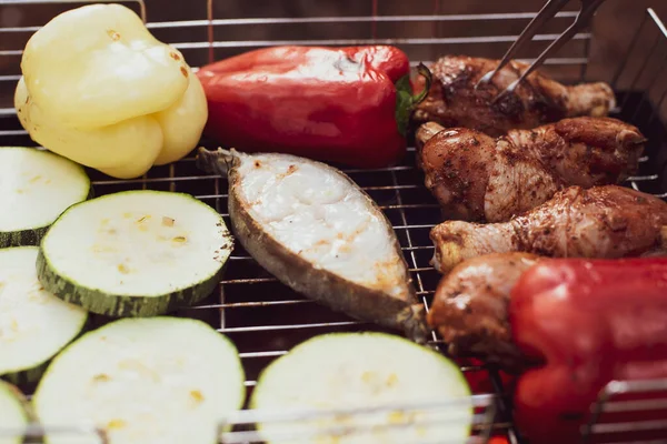 Outdoor barbeque grill. Summer picnic. Outdoor recreation. Food cooked over a campfire