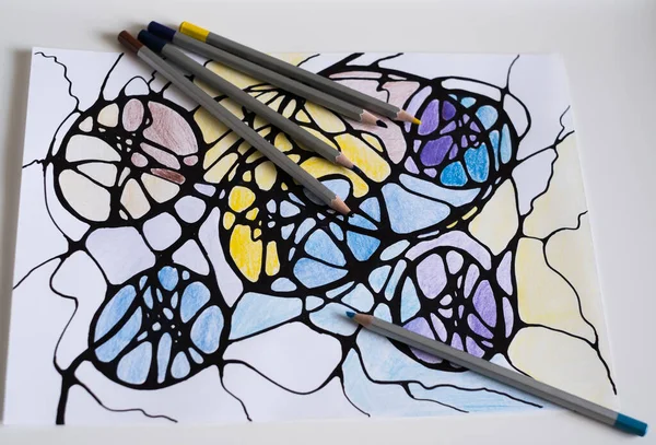 Neurographic drawing on paper with color pencils. Neurographic art is an easy way to work with the subconscious mind through drawing. Taking care of yourself