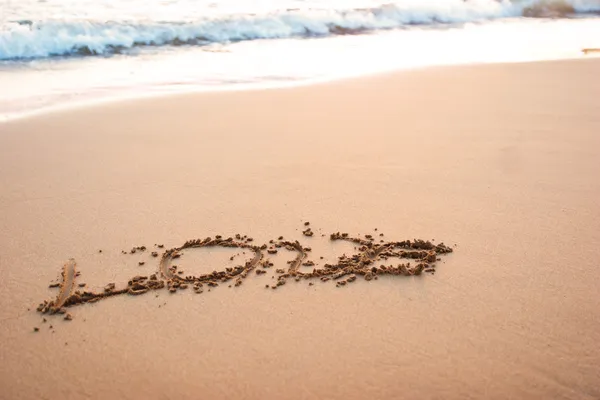 Wort Liebe im Sand — Stockfoto