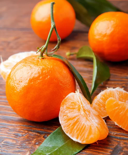 Tangerines on wooden table — Stock Photo, Image