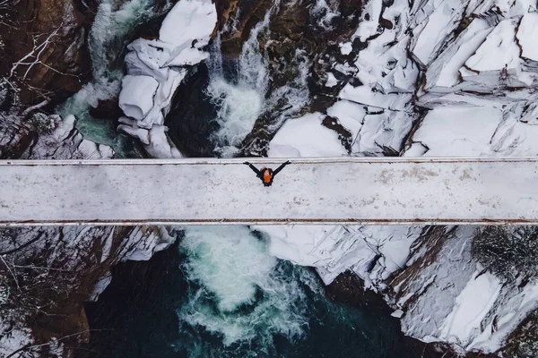 Aerial Drone Shot Woman Standing Bridge Mountain River Winter Outdoor — Stock Photo, Image
