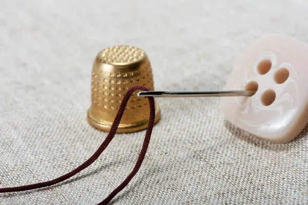 Thimble and needle — Stock Photo, Image